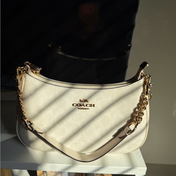 Coach Handbags - Coach Ivory Shoulder Bag with Gold Accents